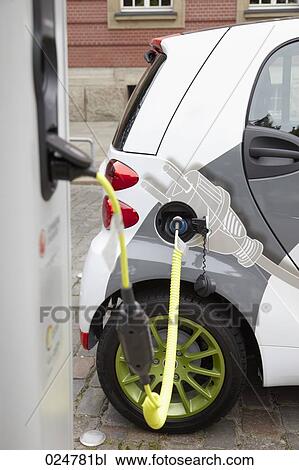 electric car being recharged View Large Photo Image Stock Image - electric car being recharged. Fotosearch