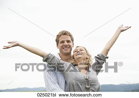 portrait of happy young couple View Large Photo Image Stock Image - portrait of happy young couple. Fotosearch
