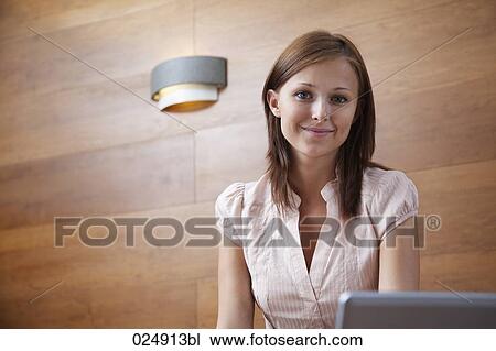 portrait of young woman with laptop computer View Large Photo Image Stock Image - portrait of young woman with laptop computer. Fotosearch