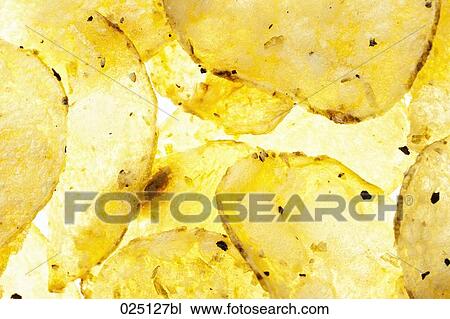close-up of potato crisps View Large Photo Image Stock Image - close-up of potato crisps. Fotosearch