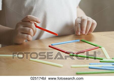 detail of young girl playing placing game View Large Photo Image Stock Image - detail of young girl playing placing game. Fotosearch