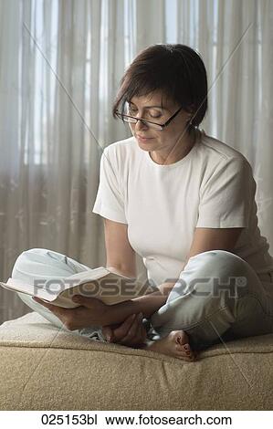 mature woman reading at home View Large Photo Image Stock Image - mature woman reading at home. Fotosearch