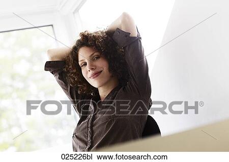 portrait of content young businesswoman View Large Photo Image Stock Image - portrait of content young businesswoman. Fotosearch