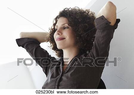 Stock Image - portrait of content young businesswoman. Fotosearch
