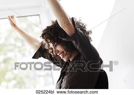 portrait of young businesswoman cheering View Large Photo Image Stock Image - portrait of young businesswoman cheering. Fotosearch