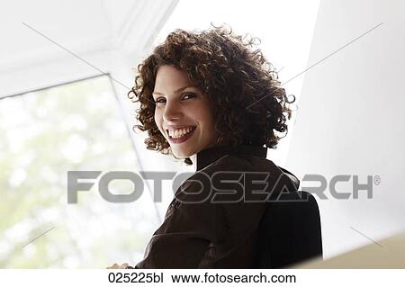 Stock Image - portrait of young businesswoman. Fotosearch