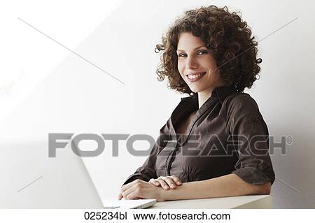 portrait of young businesswoman with laptop computer View Large Photo Image Stock Image - portrait of young businesswoman with laptop computer. Fotosearch
