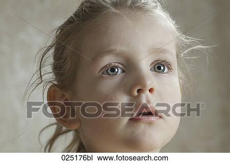 portrait of young girl looking astonished View Large Photo Image Stock Image - portrait of young girl looking astonished. Fotosearch