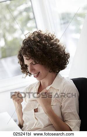 portrait of young woman with curly hair View Large Photo Image Stock Image - portrait of young woman with curly hair. Fotosearch