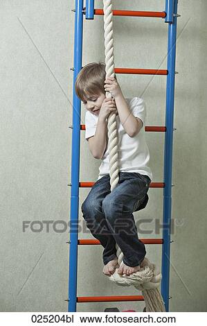 young boy playing at home View Large Photo Image Stock Image - young boy playing at home. Fotosearch