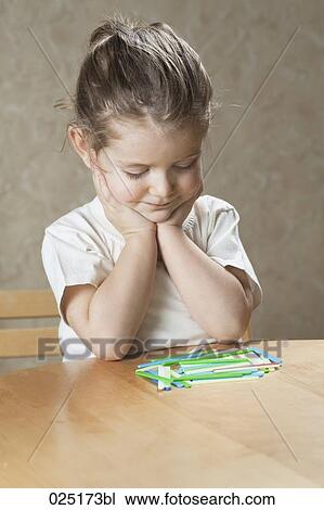 young girl with placing game View Large Photo Image Stock Image - young girl with placing game. Fotosearch