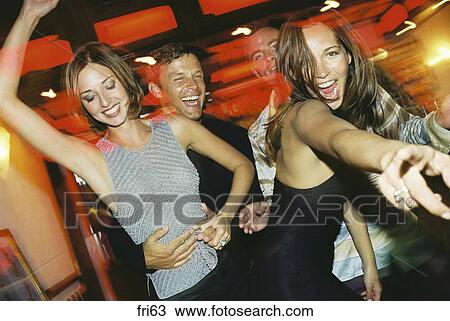 Stock Photo - cheering, bar, celebrating, casual, blurry, adults. Fotosearch - Search Stock Images, Poster Photographs, Pictures, and Clip Art Photos