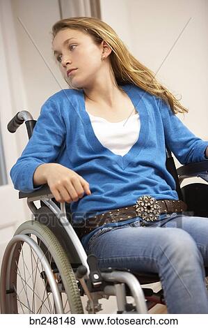 Teen girl in wheelchair Stock Photo | bn248148 | Fotosearch