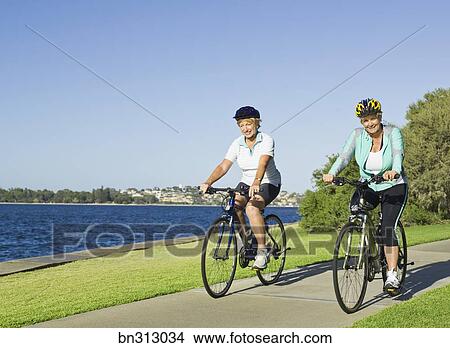 women riding bicycles