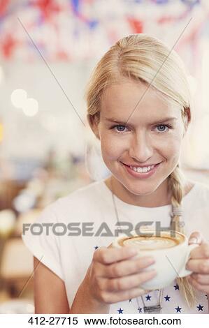 Close up portrait blonde woman drinking cappuccino View Large Photo Image Stock Photography - Close up portrait blonde woman drinking cappuccino. Fotosearch