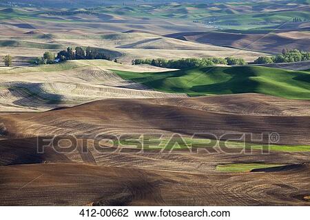 Stock Image - Aerial view of rolling landscape. Fotosearch