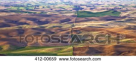 Stock Photo - Aerial view of rolling landscape. Fotosearch