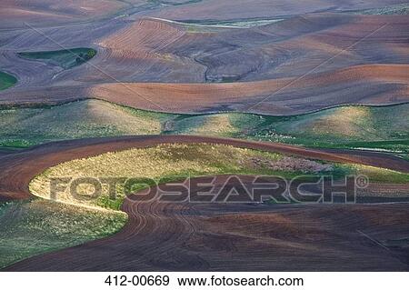 Aerial view of rolling landscape View Large Photo Image Stock Photo - Aerial view of rolling landscape. Fotosearch