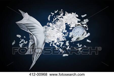 Alarm clock blasting through feather pillow View Large Photo Image Stock Photo - Alarm clock blasting through feather pillow. Fotosearch
