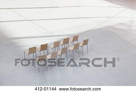 Picture - Chairs in a row in empty lobby. Fotosearch