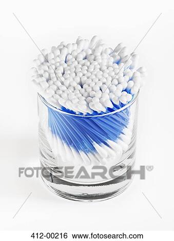 Stock Photograph - Close up of cotton swabs in jar. Fotosearch