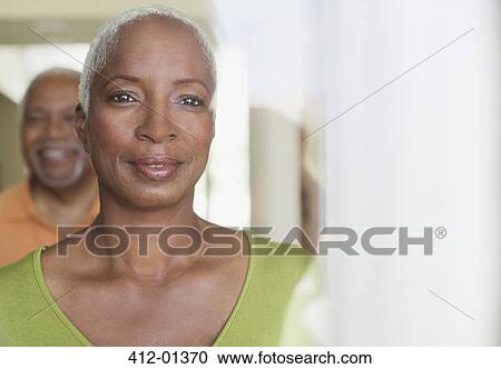 Stock Image - Close up of older woman's smiling fac. Fotosearch