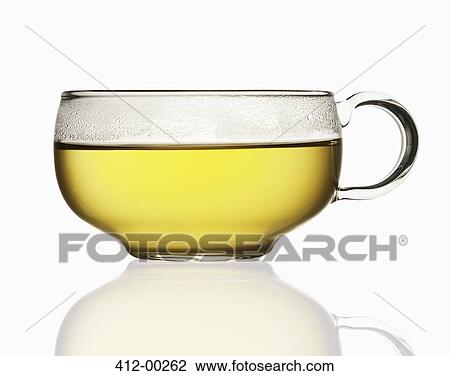 Stock Image - Close up of tea in transparent teacup. Fotosearch
