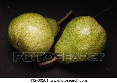 Stock Image - Close up of two green pears. Fotosearch