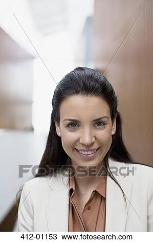 Stock Image - Close up portrait of smiling businesswoman. Fotosearch