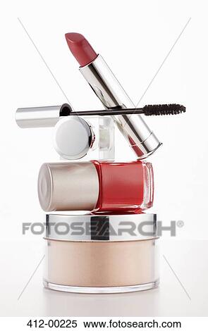 Lipstick, mascara and fingernail polish stacked on moisturizer jar View Large Photo Image Stock Photography - Lipstick, mascara and fingernail polish stacked on moisturizer jar. Fotosearch
