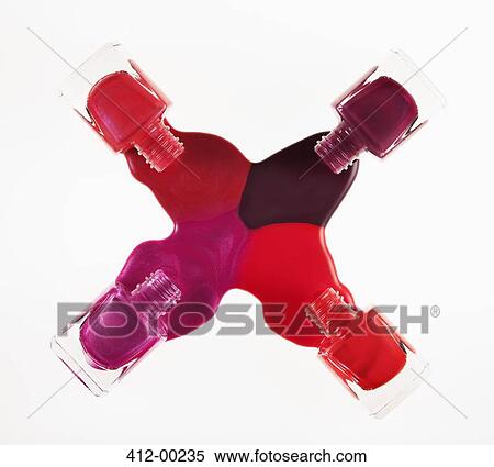 Multicolor fingernail polish spilling from bottles View Large Photo Image Stock Photography - Multicolor fingernail polish spilling from bottles. Fotosearch