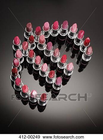 Multicolor lipsticks forming euro symbol View Large Photo Image Stock Photo - Multicolor lipsticks forming euro symbol. Fotosearch