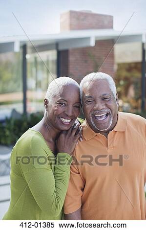 Older couple smiling outdoors View Large Photo Image Stock Photography - Older couple smiling outdoors. Fotosearch