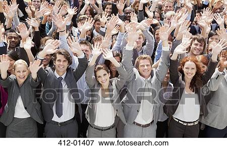 Portrait of cheering business people in crowd View Large Photo Image Stock Photo - Portrait of cheering business people in crowd. Fotosearch