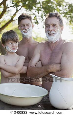 Portrait of multi-generation men with arms crossed and shaving cream on faces View Large Photo Image Stock Image - Portrait of multi-generation men with arms crossed and shaving cream on faces. Fotosearch