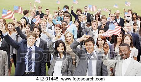 Portrait of smiling business people waving American flags overhead View Large Photo Image Stock Photography - Portrait of smiling business people waving American flags overhead. Fotosearch