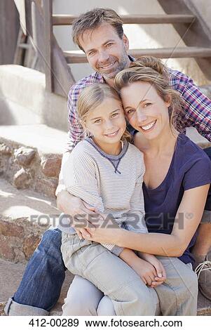 Portrait of smiling family View Large Photo Image Stock Photo - Portrait of smiling family. Fotosearch