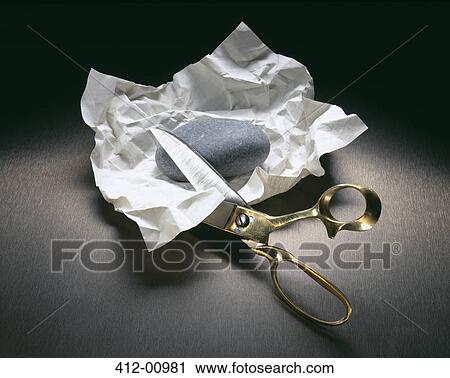 Scissors cutting into paper with rock View Large Photo Image Stock Image - Scissors cutting into paper with rock. Fotosearch