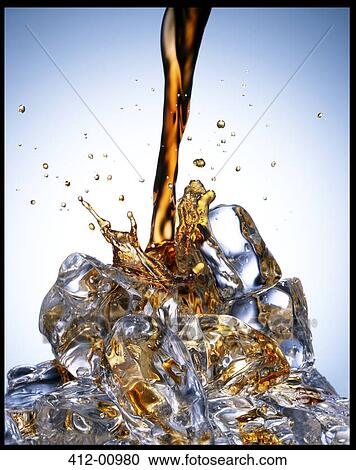Soda pouring over ice View Large Photo Image Stock Image - Soda pouring over ice. Fotosearch