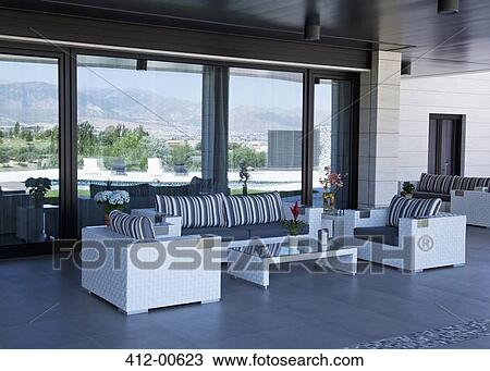 Sofa and chairs on luxury patio View Large Photo Image Stock Image - Sofa and chairs on luxury patio. Fotosearch