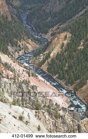 Aerial view of river in rocky canyon View Large Photo Image Stock Photo - Aerial view of river in rocky canyon. Fotosearch
