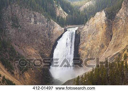 Aerial view of waterfall in rocky canyon View Large Photo Image Stock Photo - Aerial view of waterfall in rocky canyon. Fotosearch