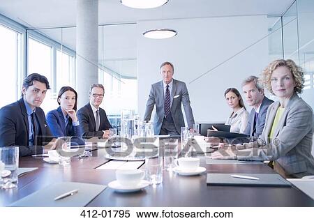 Business people sitting in meeting View Large Photo Image Stock Photography - Business people sitting in meeting. Fotosearch