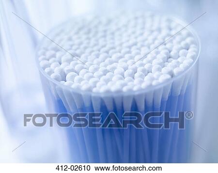 Stock Image - Close up of cup of cotton buds. Fotosearch