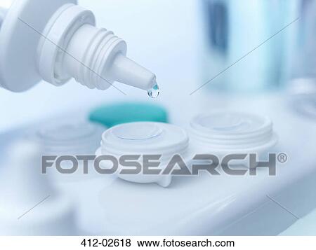 Close up of saline dropping on contact lens View Large Photo Image Stock Photo - Close up of saline dropping on contact lens. Fotosearch