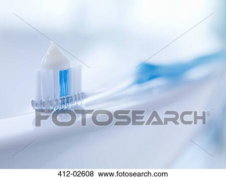 Close up of toothbrush with toothpaste View Large Photo Image Stock Photo - Close up of toothbrush with toothpaste. Fotosearch