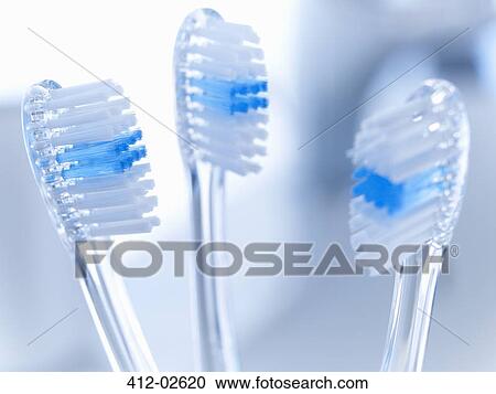 Stock Image - Close up of toothbrushes. Fotosearch
