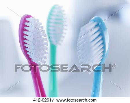 Close up of toothbrushes View Large Photo Image Stock Photo - Close up of toothbrushes. Fotosearch