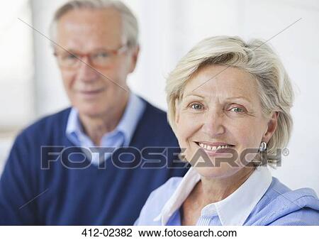 Couple smiling together outdoors View Large Photo Image Stock Image - Couple smiling together outdoors. Fotosearch