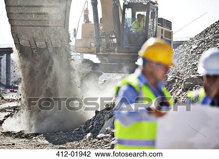 Digger working in quarry View Large Photo Image Stock Image - Digger working in quarry. Fotosearch